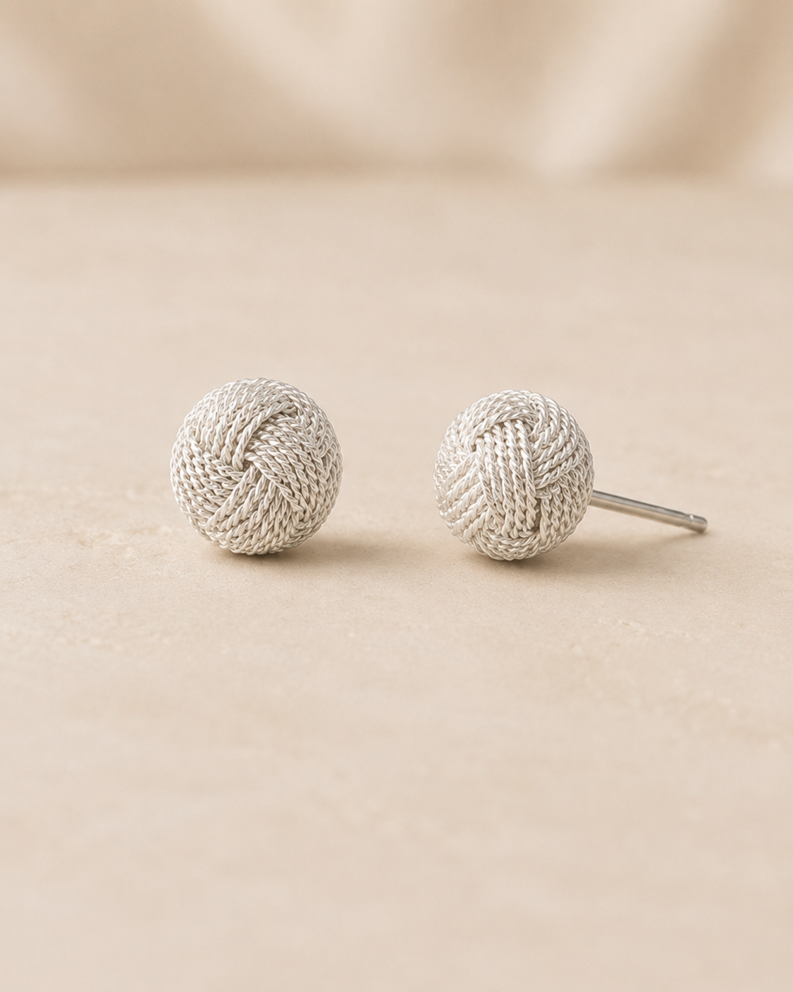 Handcrafted filigree knot stud earrings in Colombian 925 sterling silver. Bold 10 mm woven design made by hand in Santa Fe de Antioquia.