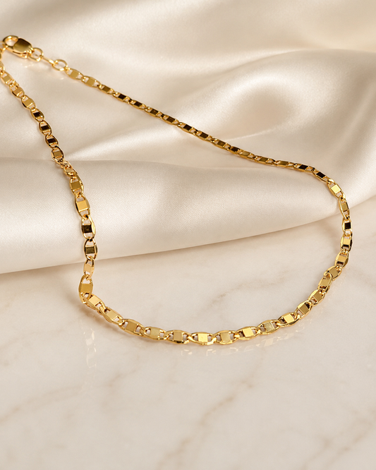 Step into elegance with our curated collection of artisan-crafted anklets. At Nosso Galeon, we redefine everyday luxury. Each piece is meticulously created using authentic 18k Gold Filled (a 3-layer bonding process), ensuring a durable, waterproof, and hypoallergenic finish that maintains the look and feel of solid gold. From delicate diamond-cut chains to modern statement pieces, our anklets are designed to move with you—from sunny beach days to sophisticated nights out. Discover the perfect ankle bracelet