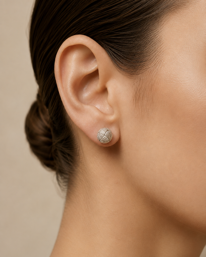 Dainty handcrafted filigree knot studs in Colombian 925 sterling silver. Delicate 6 mm woven design made by hand in Santa Fe de Antioquia.