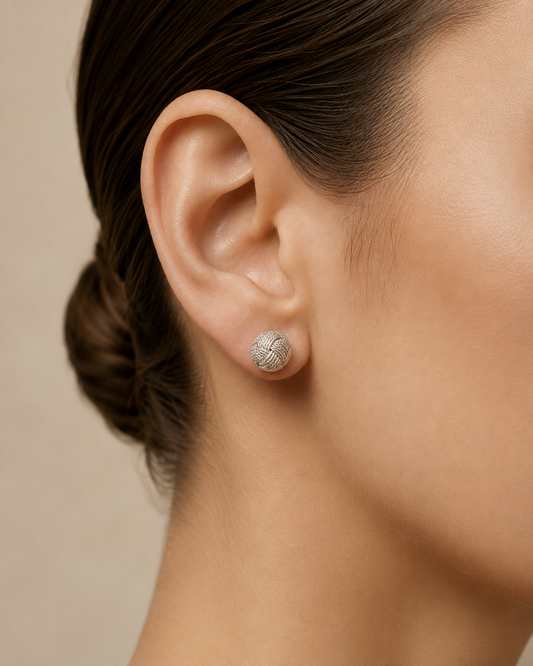 Dainty handcrafted filigree knot studs in Colombian 925 sterling silver. Delicate 6 mm woven design made by hand in Santa Fe de Antioquia.
