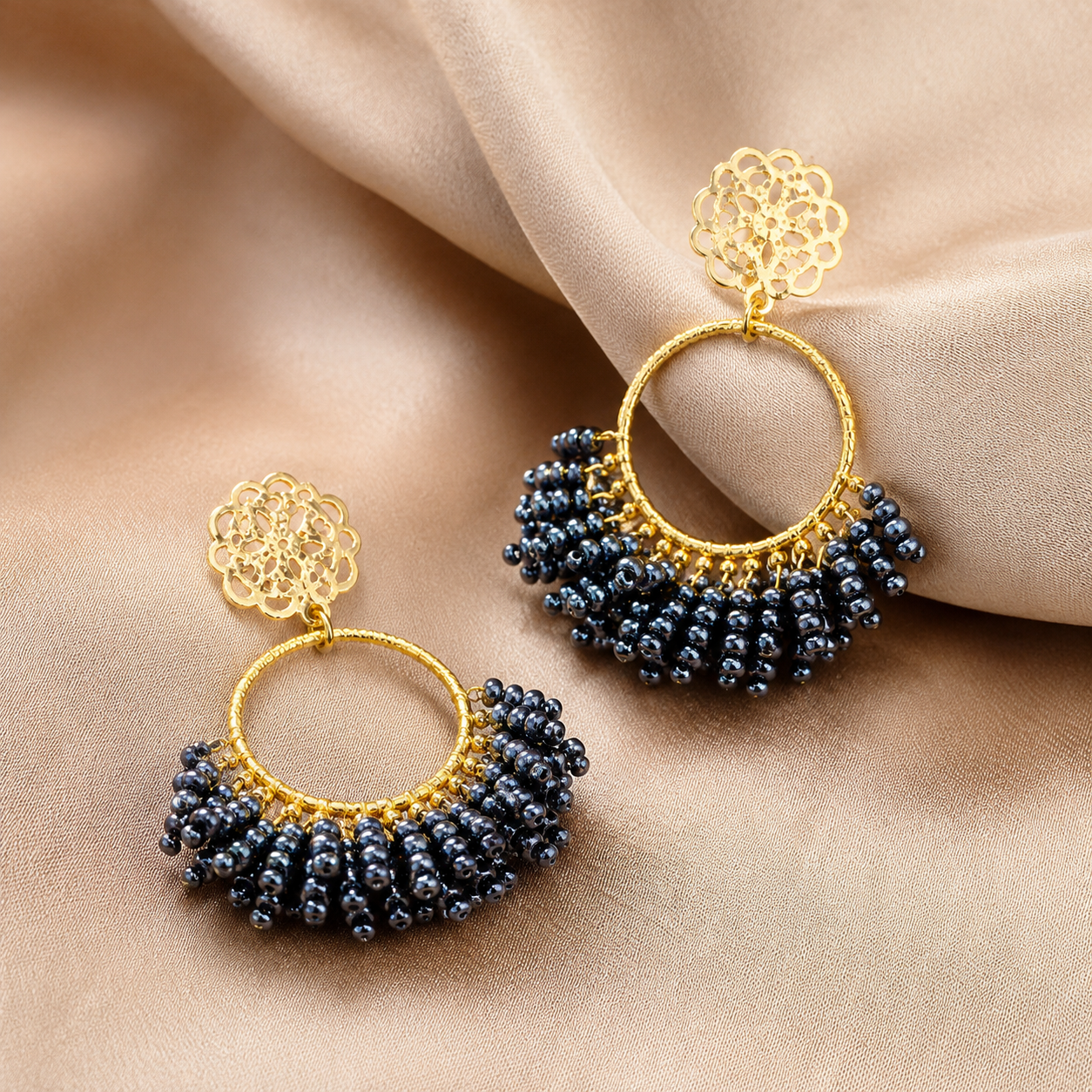  Navy blue seed bead statement earrings with 18k gold plated filigree rosette on beige silk, handmade in Colombia